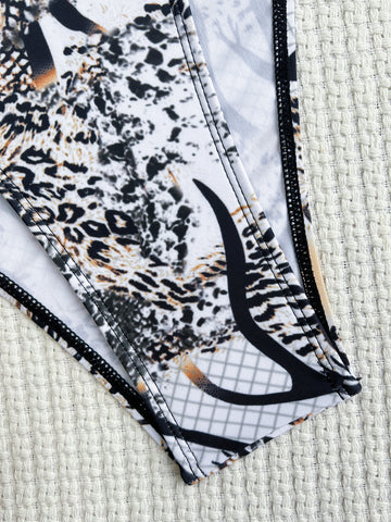Chic Allure - Deep V-Neck Printed Cutout Monokini for Trendsetting Swimwear Chic Allure - Deep V-Neck Printed Cutout Monokini for Trendsetting Swimwear