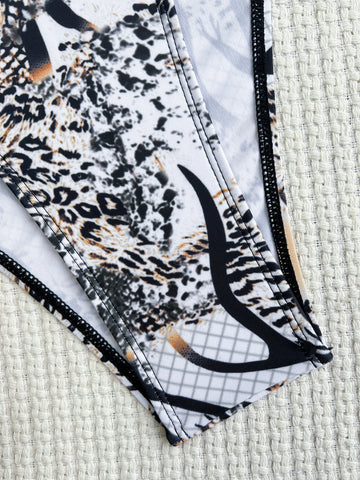 Chic Allure - Deep V-Neck Printed Cutout Monokini for Trendsetting Swimwear